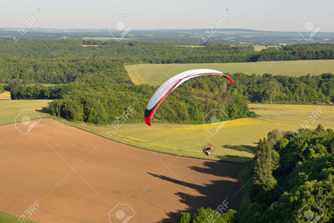 The Yonne department seen from the sky by paramotor over fields, Bourgogne region, France - 165773898 The Yonne department seen from the sky by paramotor over fields, Bourgogne region, France - 165773898
