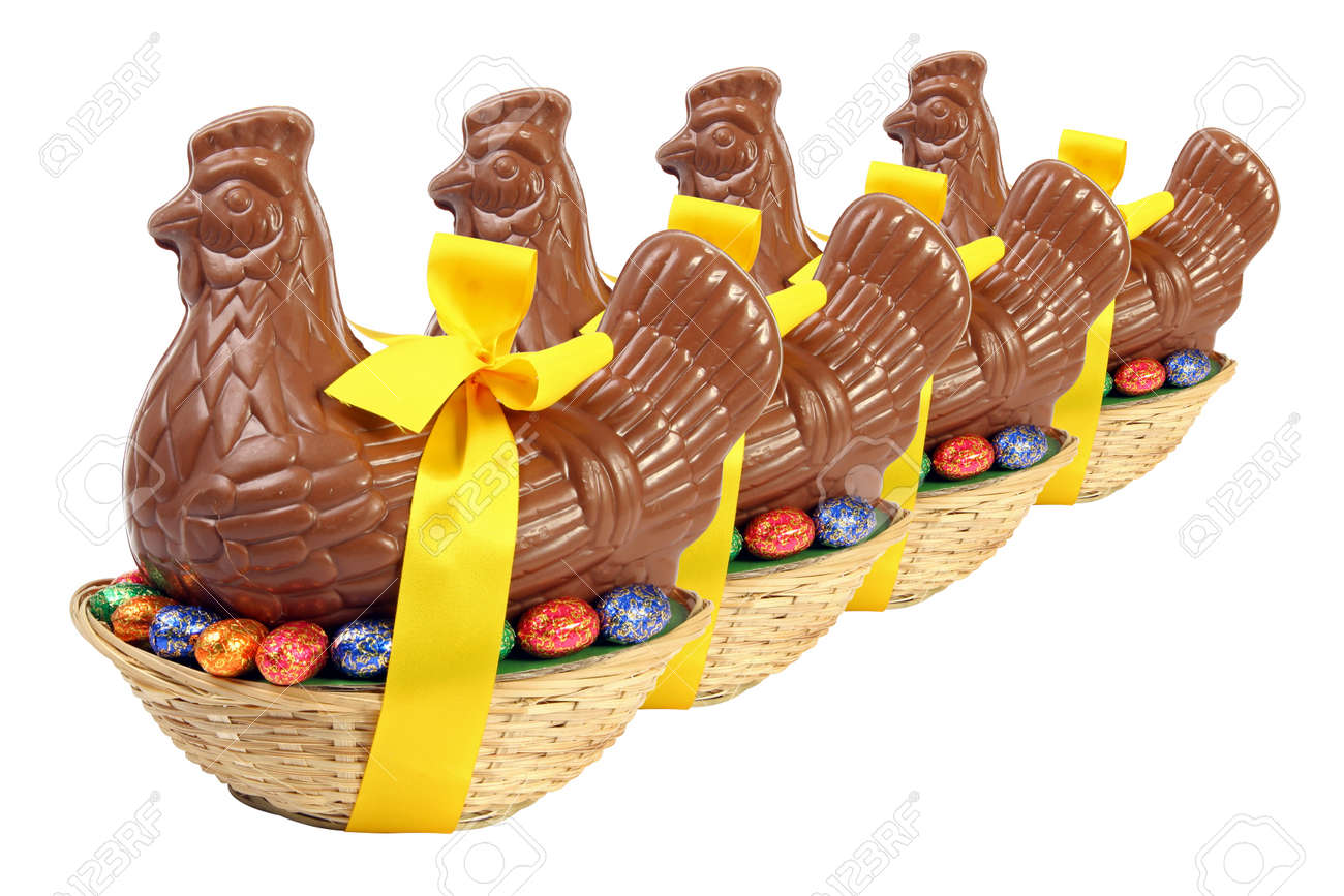 Set of chocolate Easter hen and chicken with yellow ribbon and bow, presented in a basket with decorative eggs, cut out and isolated on white background - 166000613 Set of chocolate Easter hen and chicken with yellow ribbon and bow, presented in a basket with decorative eggs, cut out and isolated on white background - 166000613