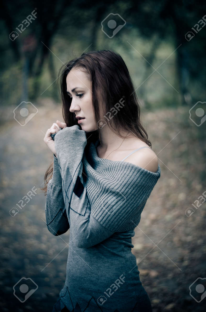 Sad Girl Alone In A Dark Forest Stock Photo, Picture and Royalty Free  Image. Image 17544670., image size:861x1300