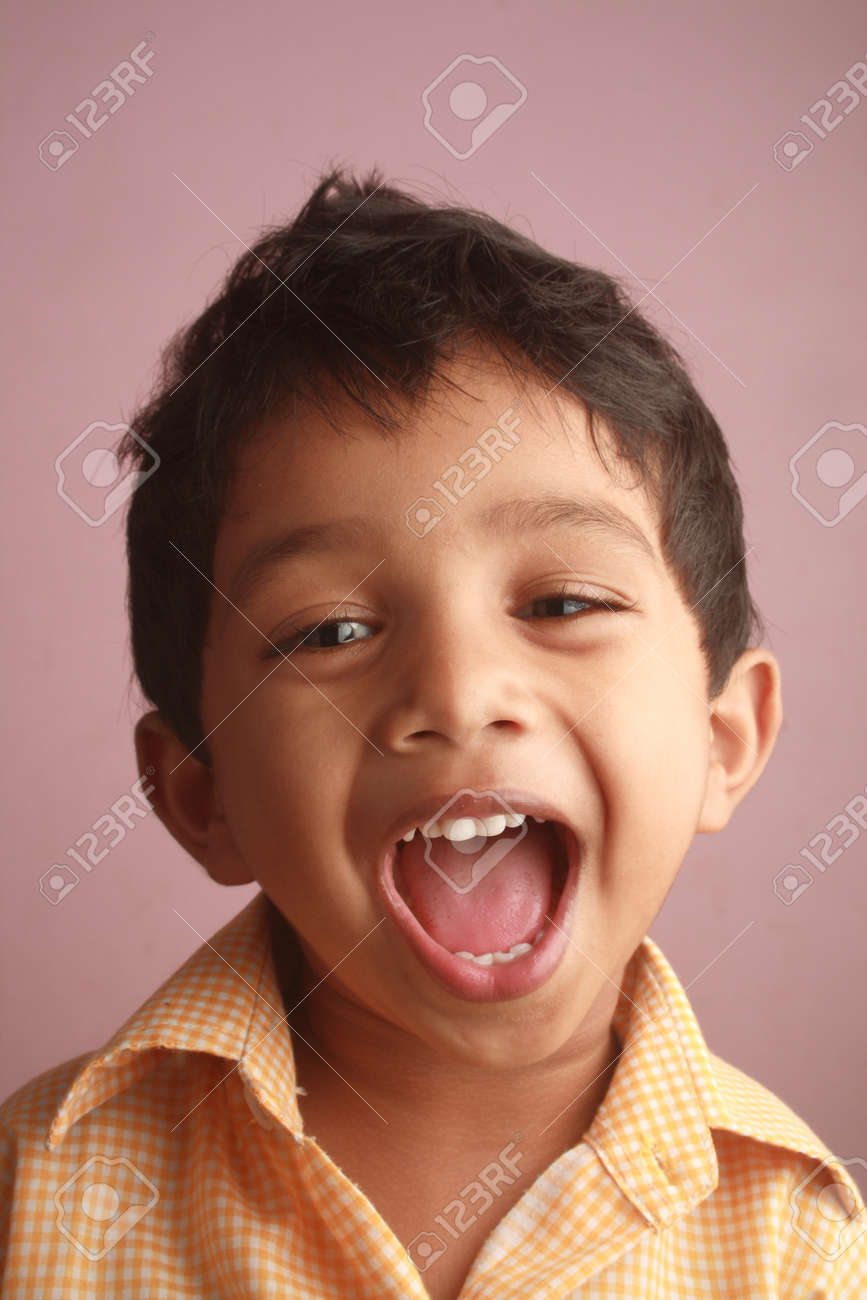 an indian boy screaming stock photo picture and royalty free image