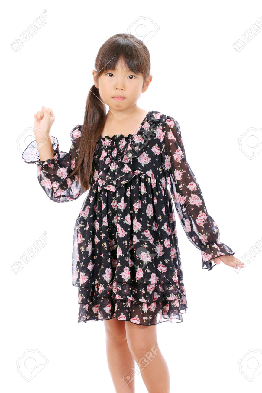 かわいいのアジアの女の子がポーズに分離ホワイト の写真素材 画像素材 Image