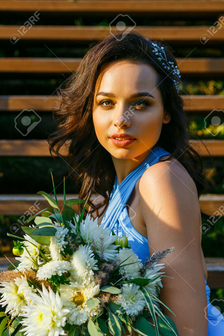 Beautiful Young Bridesmaid With Curly Hair Posing On Wedding