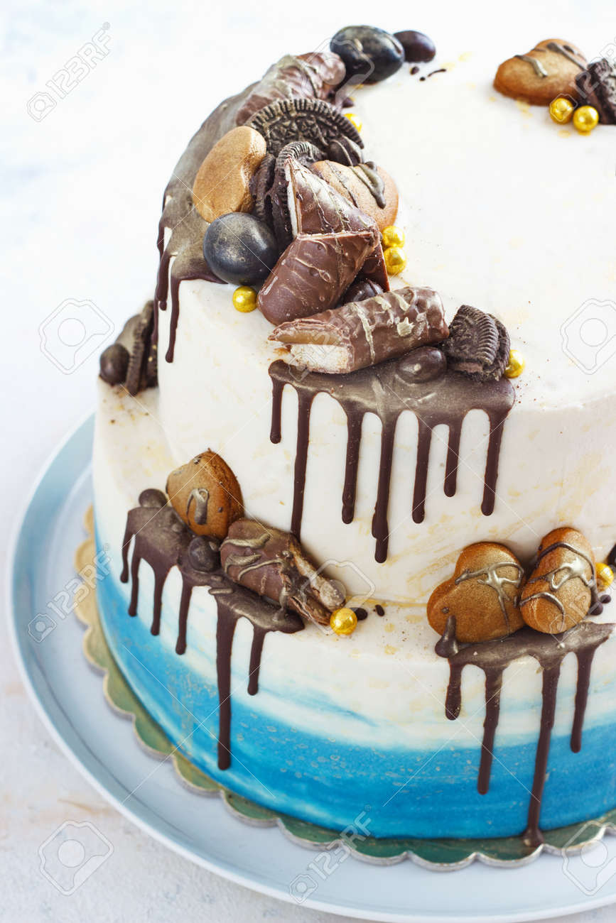 Tiered Birthday Cake On A Light Background Male Cake Stock Photo