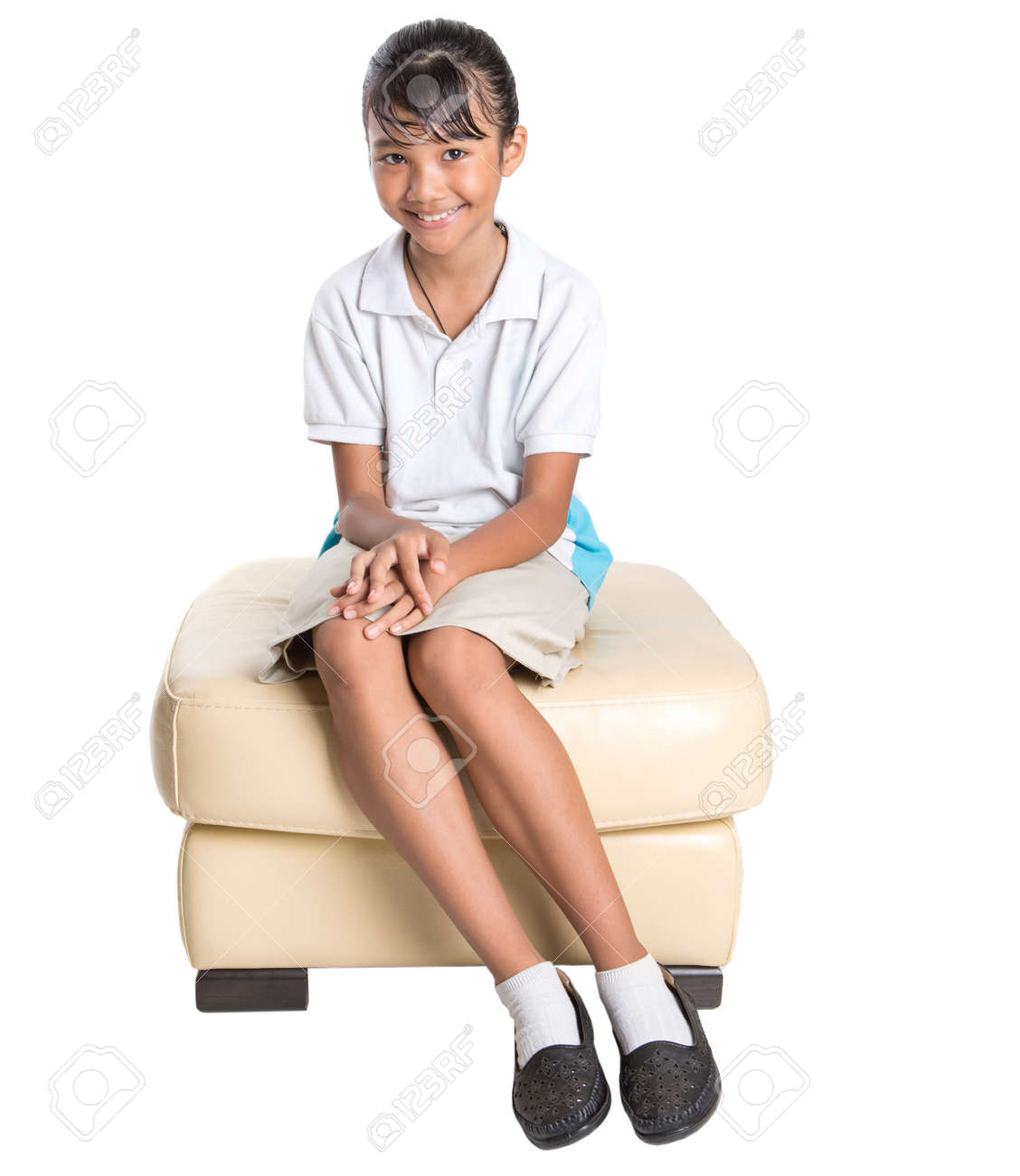 Stock Photo Young Asian School Girl In School Uniform Over White Background Stock Photo Young Asian School Girl In School Uniform Over White Background