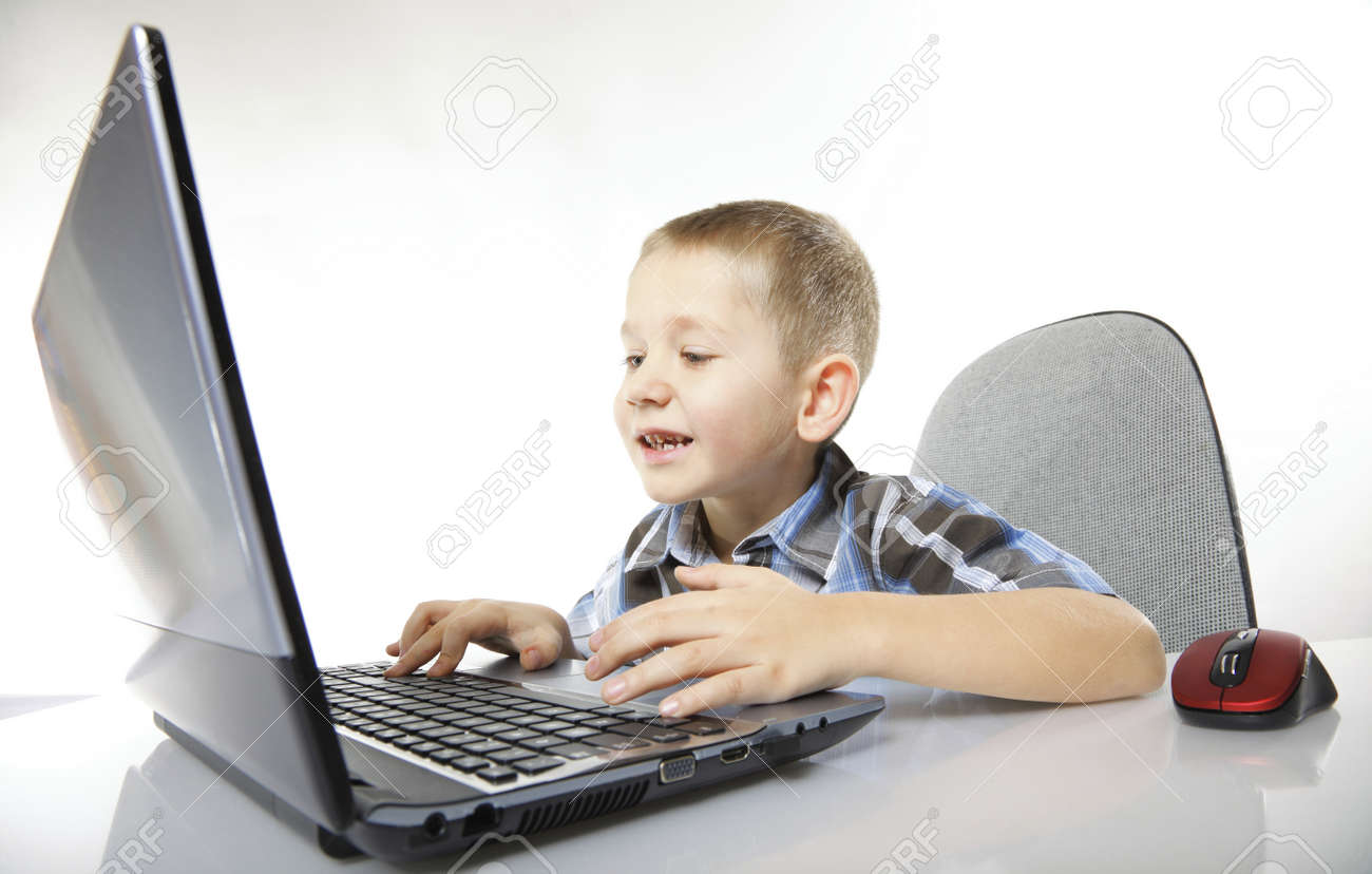 computer addiction emotional child boy with laptop notebook playing computer addiction