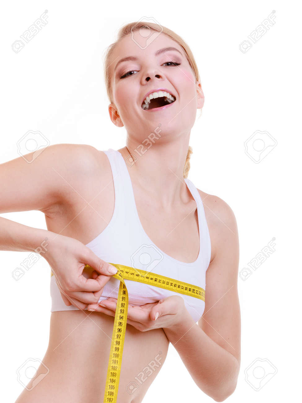 fitness girl sporty smiling woman measuring her bust size chest measuring bust size