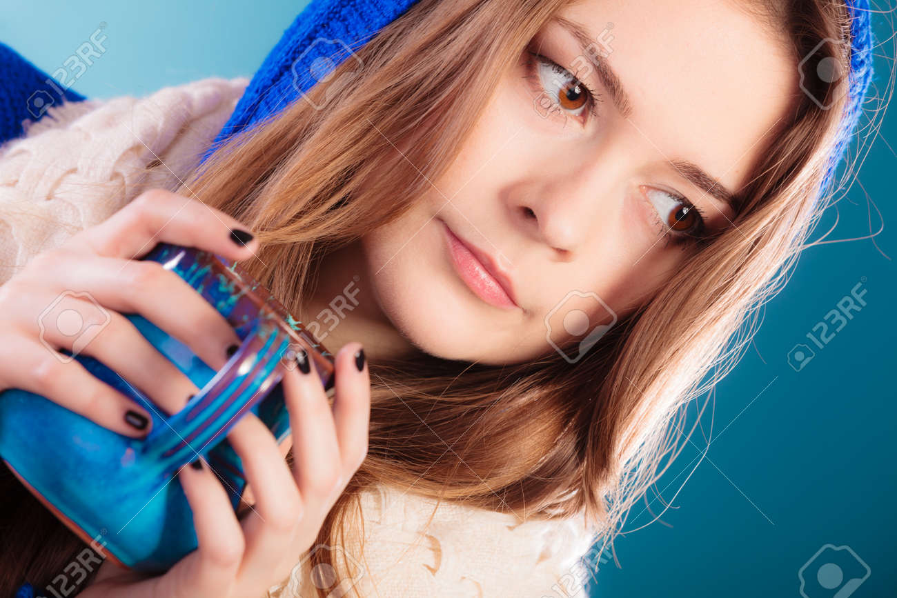 Hot Beverage Closeup Teen Girl Holding Blue Mug With Drink Tea Or Coffee Woman Hot Beverage Closeup Teen Girl Holding Blue Mug With Drink Tea Or Coffee Woman