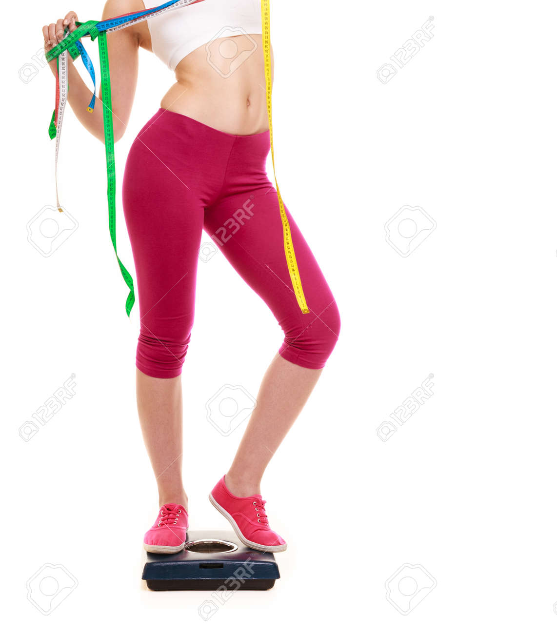 slimming and weight loss woman girl holding tape measures on measures for weight loss
