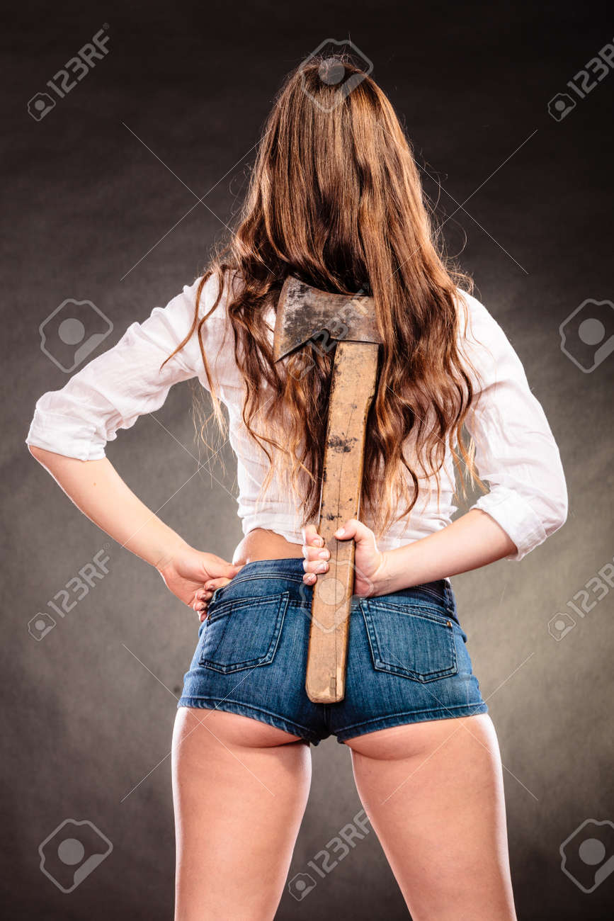 Stock Photo Sxy Woman Holding Axe Chopper Behind Back Strong Girl Feminist Independent Female Stock Photo Sxy Woman Holding Axe Chopper Behind Back Strong Girl Feminist Independent Female
