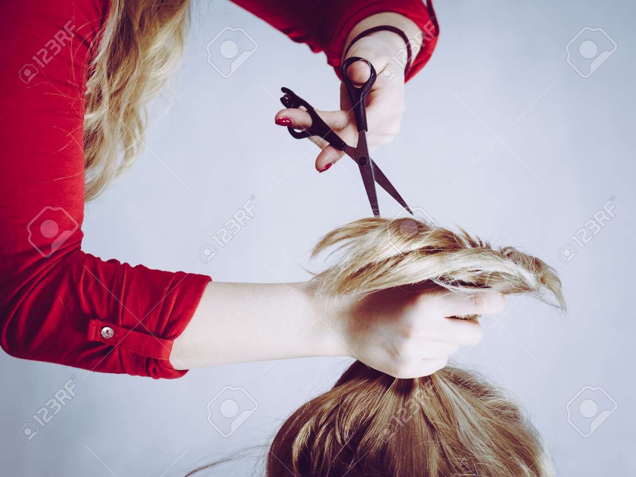 Blonde Unrecognizable Woman Getting Haircut Cutting Split Ends By Hairdresser Haircare Concept