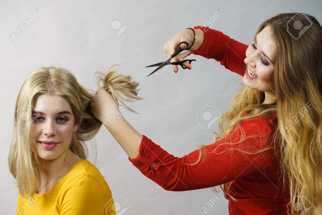 Hairstyle And Haircut Young Female Barber Holding Scissors Tool