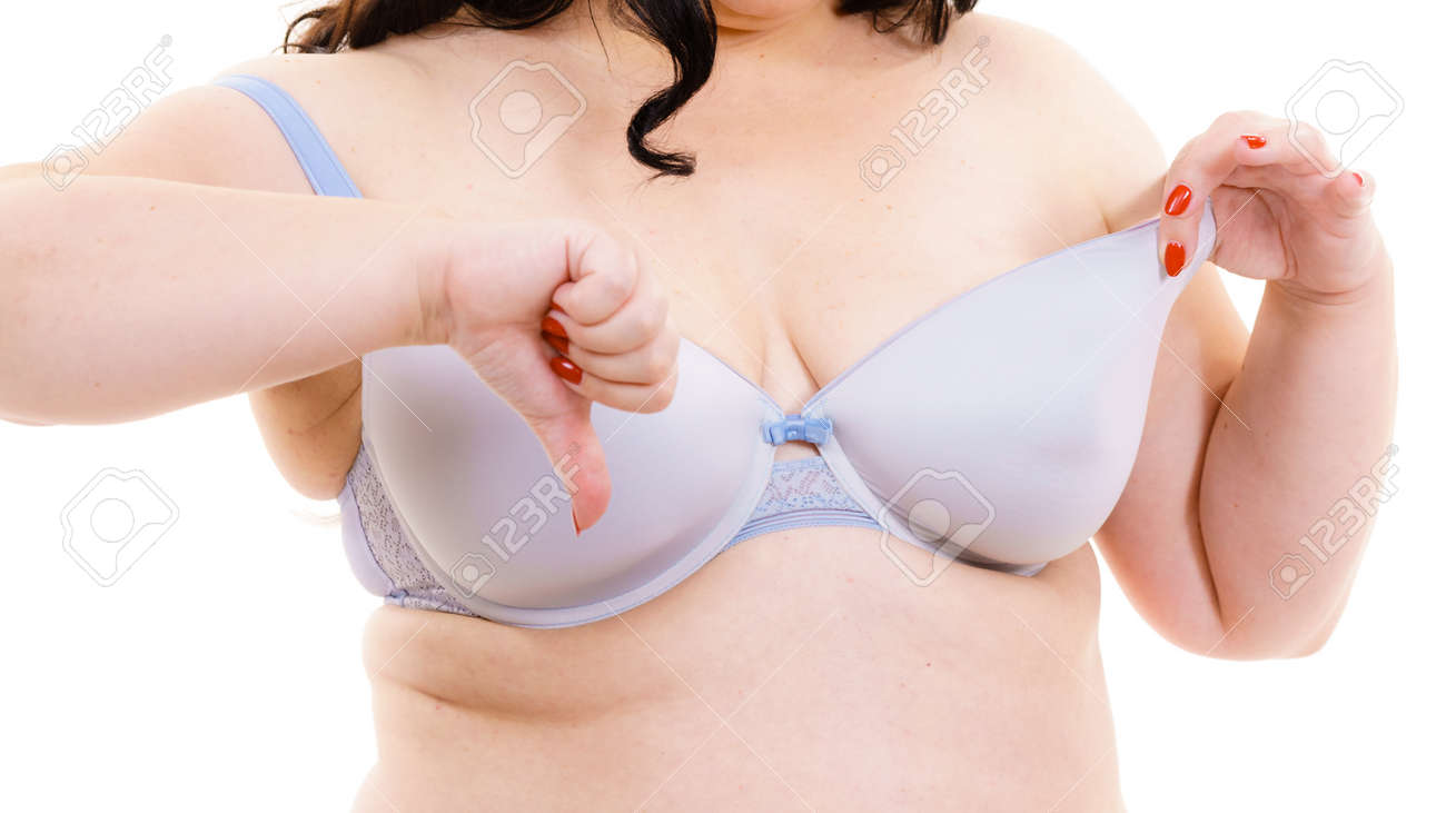 Plus Size Fat Mature Woman Wearing Bra Looking On Her Breast Boobs, Making  Thumb Down Sign. Bosom, Brafitting And Underwear Concept. Stock Photo,  Picture and Royalty Free Image. Image 129440055.