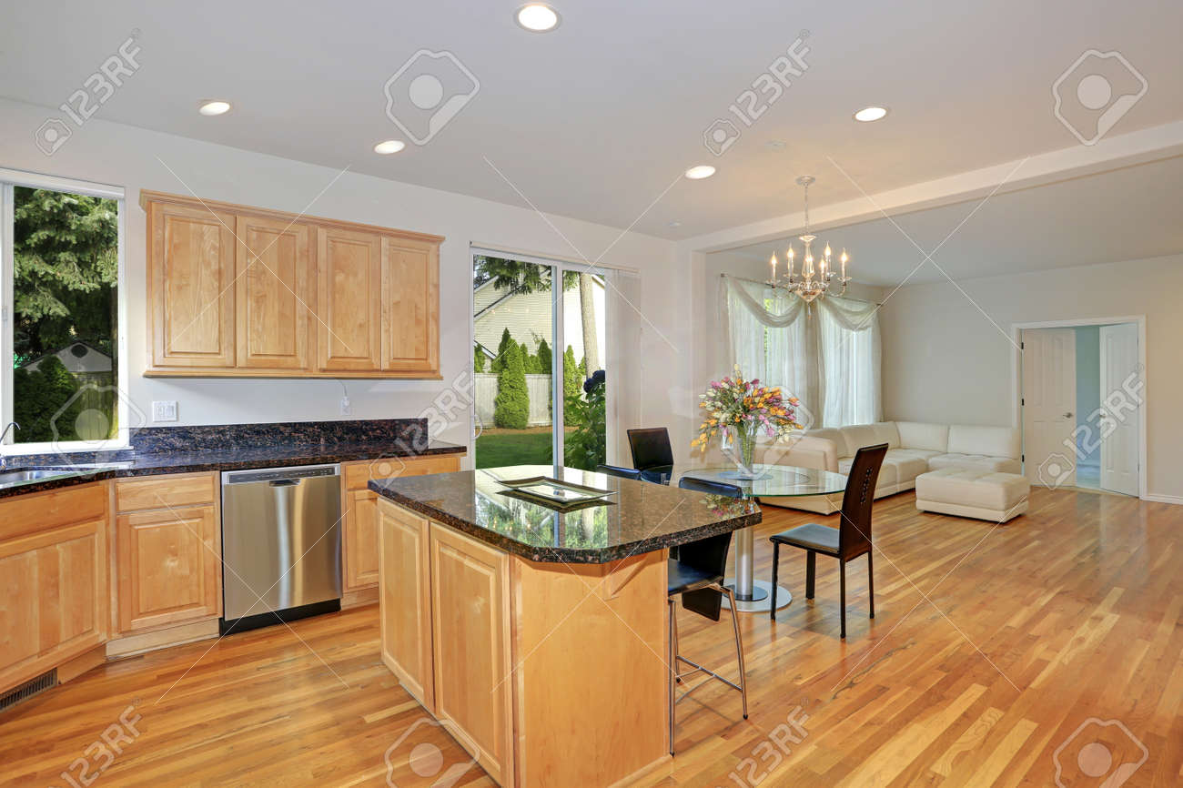 Sun Filled Gourmet Kitchen With Wooden Cabinetry Bar Style
