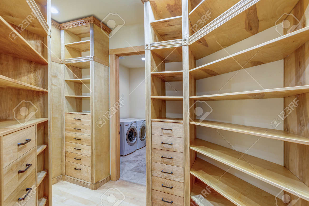 Large Walk In Closet Lined With Built In Drawers Clothes Rails