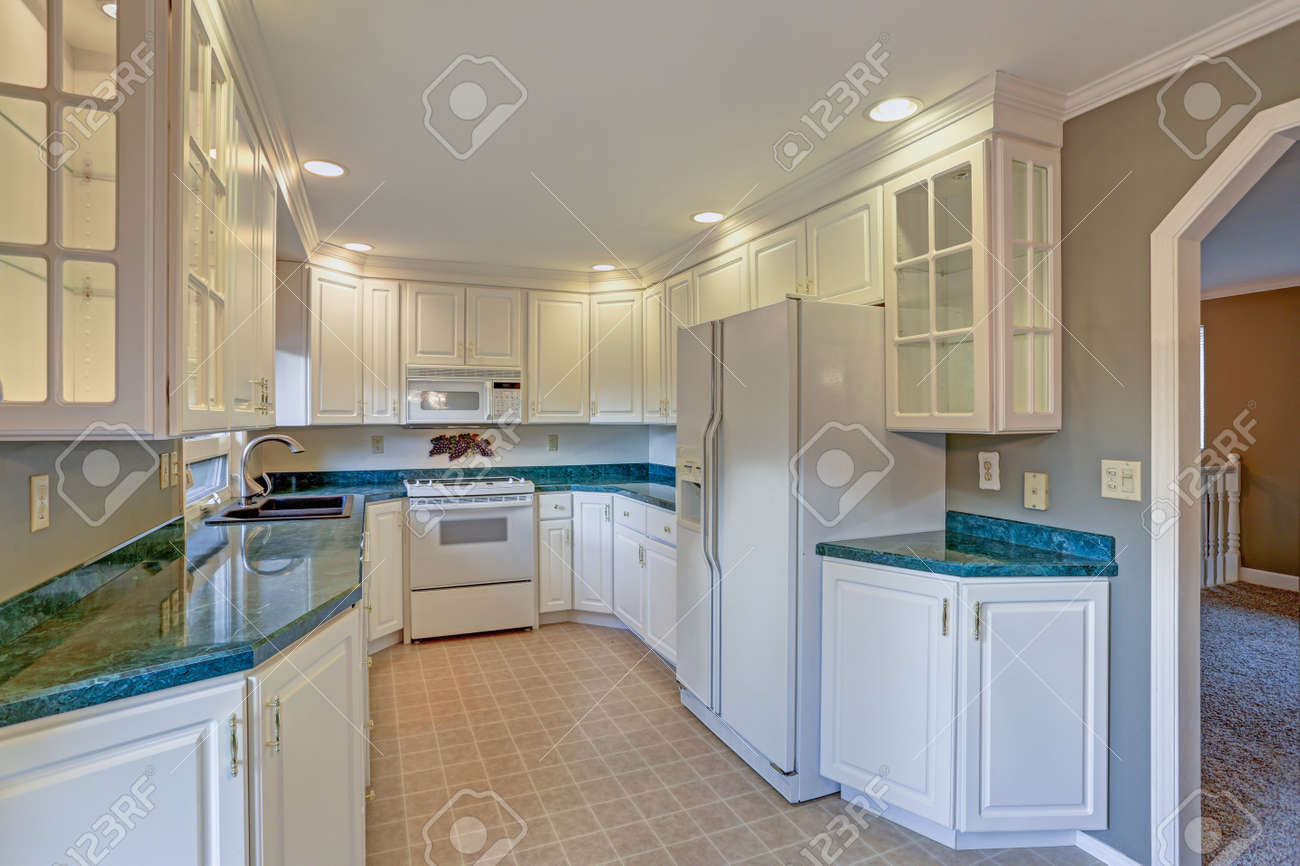 Freshly Renovated Kitchen Room With White Shaker Cabinets And