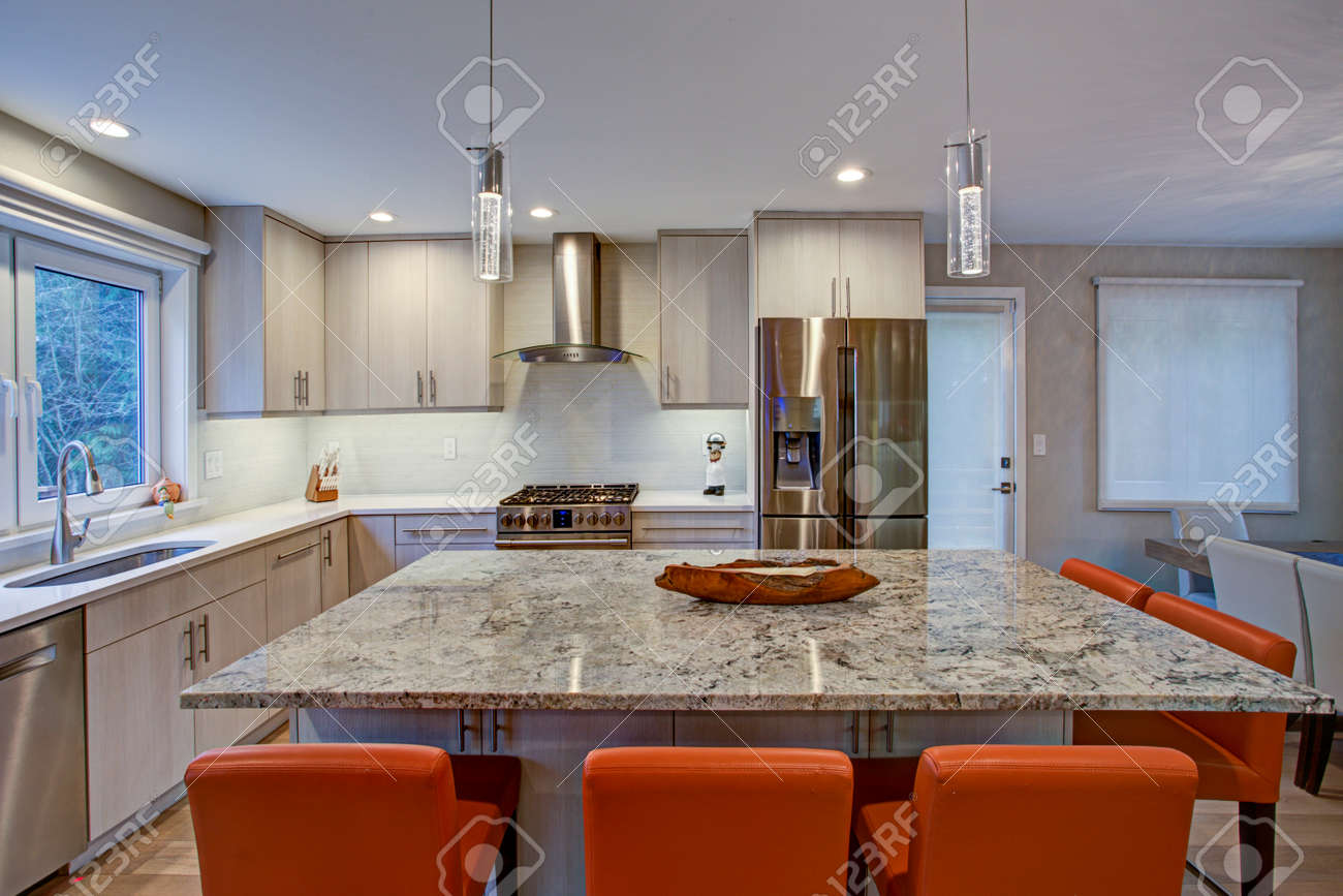 Gorgeous Kitchen Design Features Ivory Kitchen Cabinets Flanking