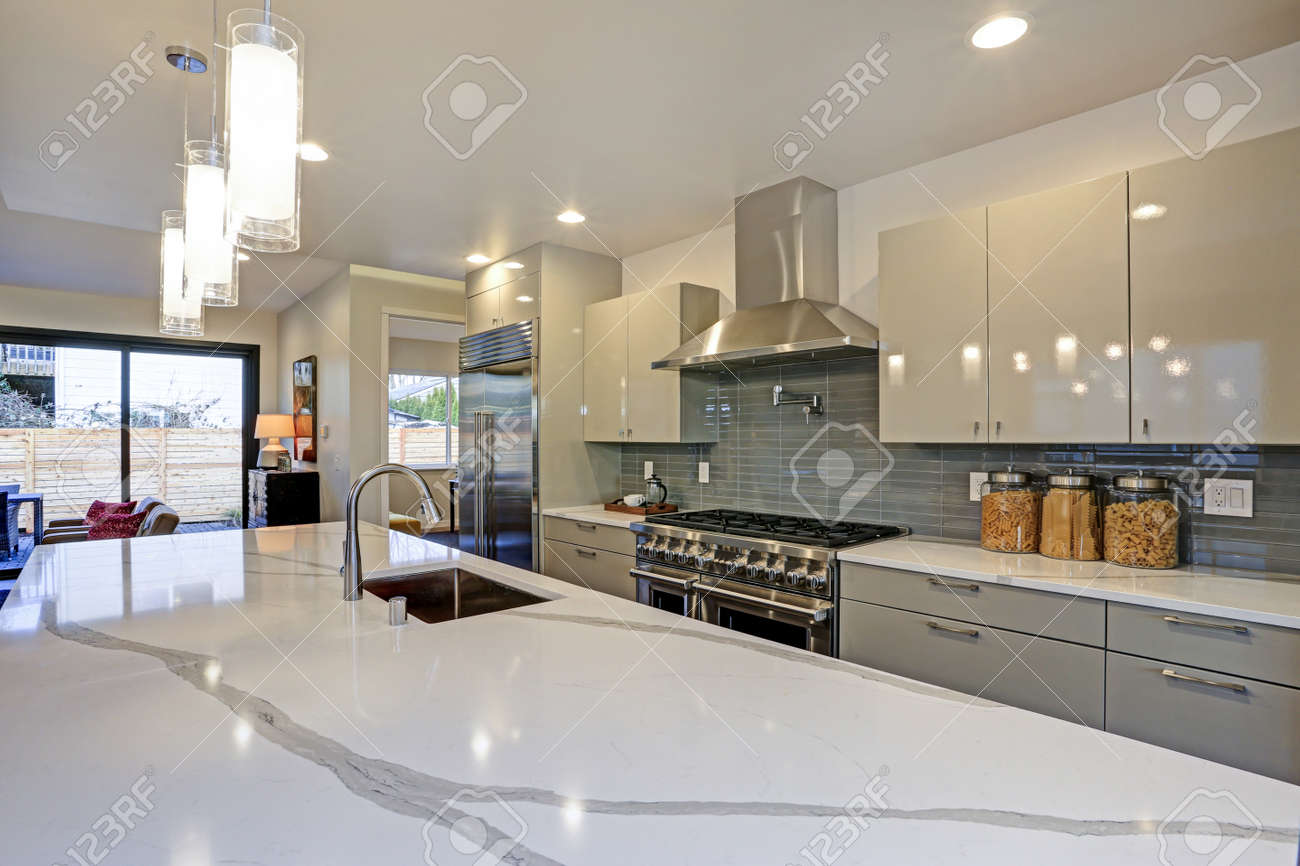 Sleek Modern Kitchen Design With A Kitchen Peninsula Fitted With Sleek Modern Kitchen Design With A Kitchen Peninsula Fitted With