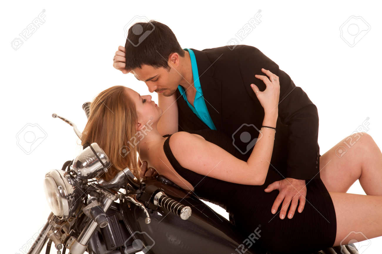 A Couple Laying Back On Her Motorcycle Getting Ready To Kiss Stock Photo Picture And Royalty Free Image Image 24994203