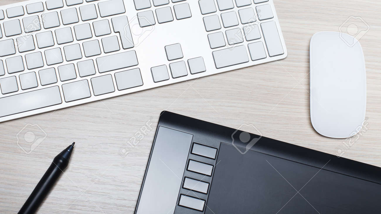 Modern Designer Office Accessory With Mouse Keyboard Drawing Stock Photo Picture And Royalty Free Image Image 76702129
