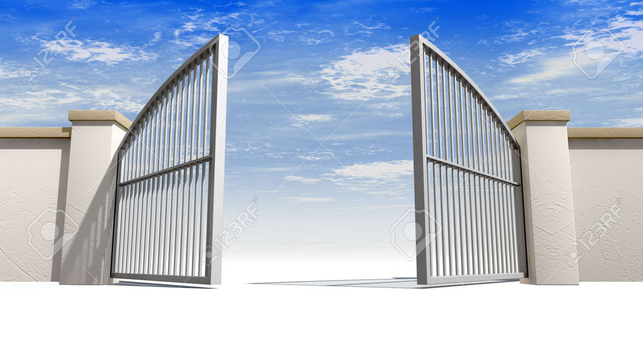 a solid garden wall with open metal gates with a blue sky in stock