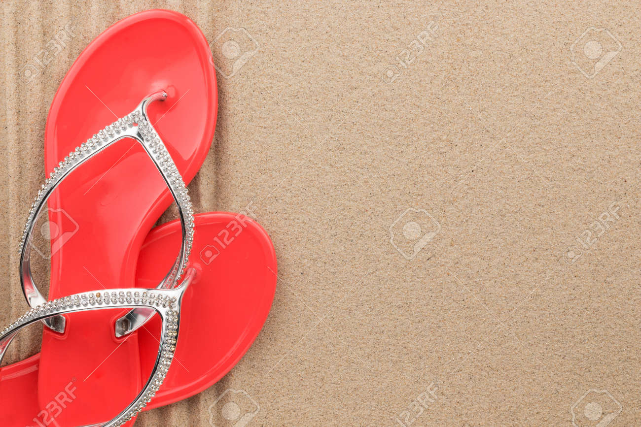 red flip flops with rhinestones