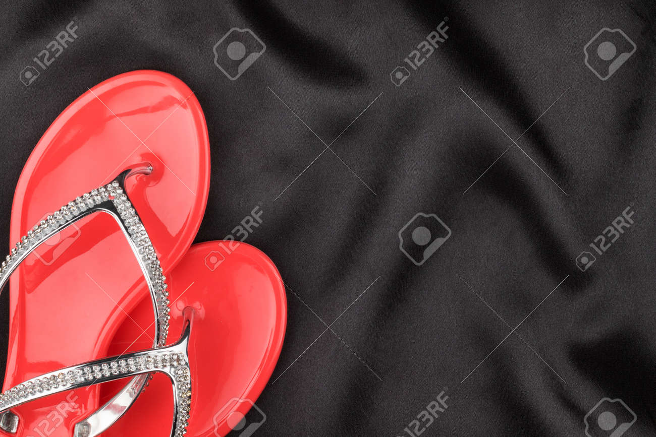 black cloth flip flops