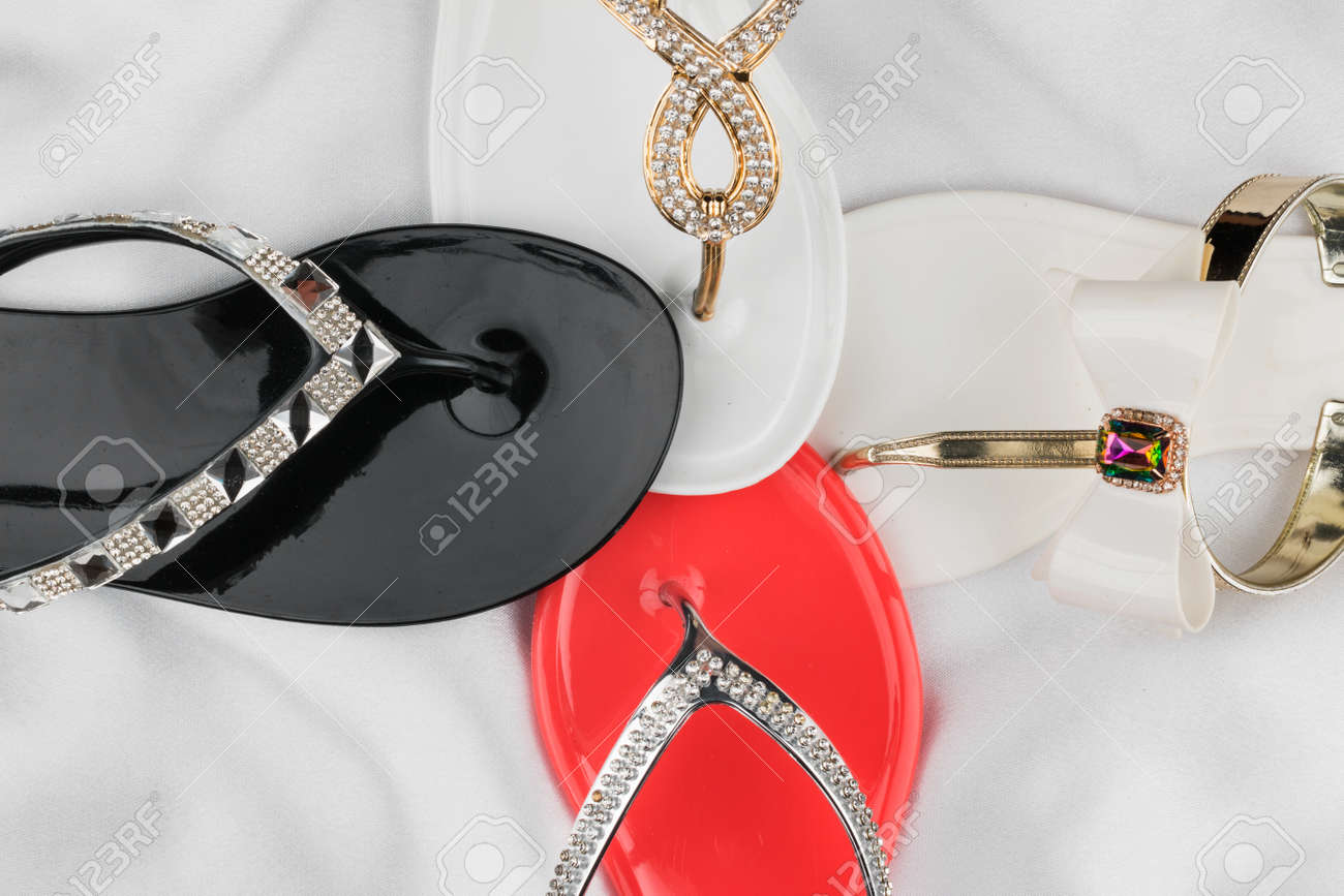 white flip flops with rhinestones