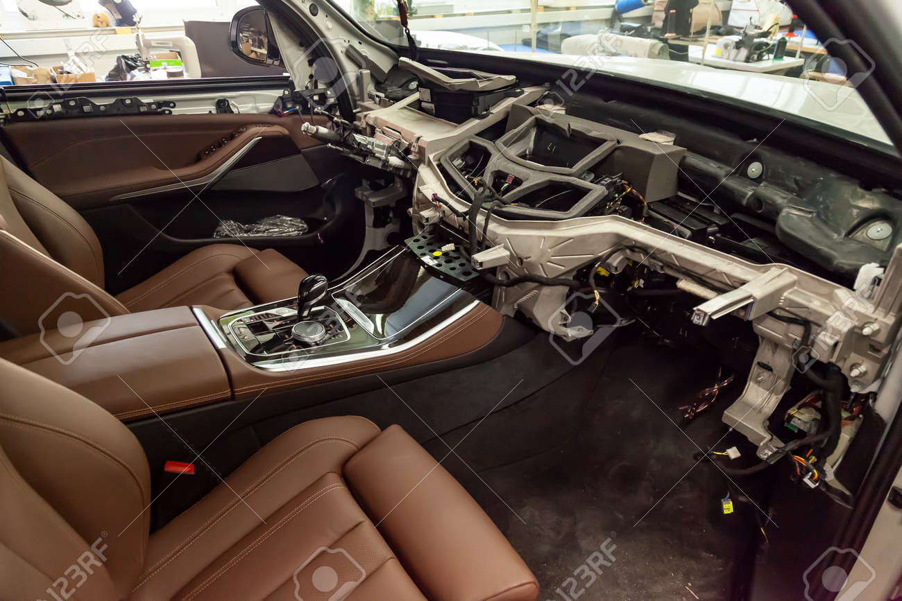 The Interior Of A Modern Business Class Car With Brown Leather