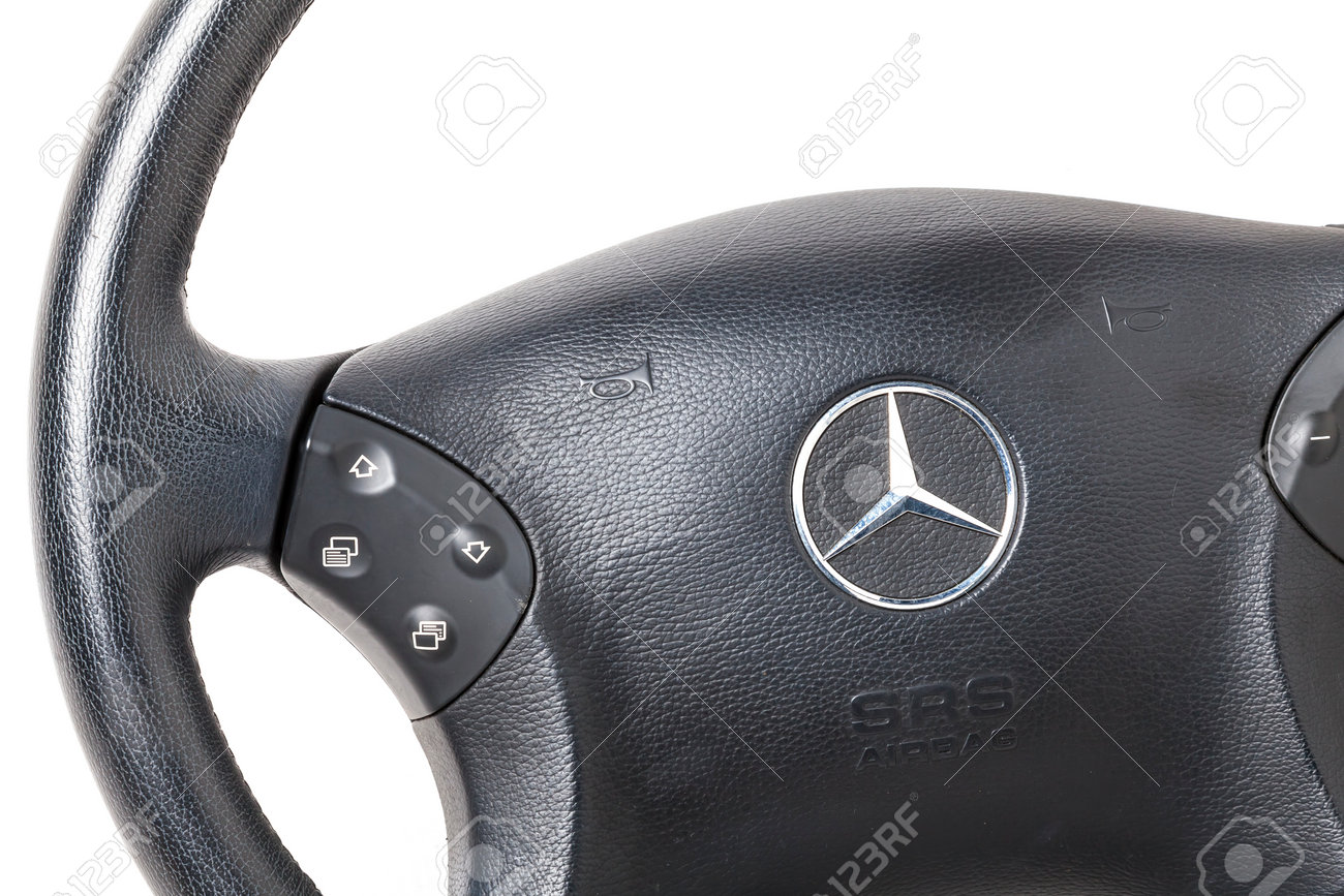 Novosibirsk, Russia - 10.30.2020: Spare part and interior element from a Mercedes-Benz car driver steering wheel on a white isolated background. Auto service industry. - 168105842 Novosibirsk, Russia - 10.30.2020: Spare part and interior element from a Mercedes-Benz car driver steering wheel on a white isolated background. Auto service industry. - 168105842