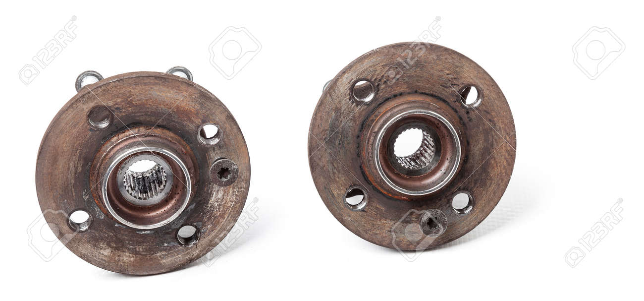 Wheel hub with bearing from old metal close-up on white isolated background in a photo studio. Seasonal repair of the suspension and braking system in the workshop or spare parts for sale. - 169051382 Wheel hub with bearing from old metal close-up on white isolated background in a photo studio. Seasonal repair of the suspension and braking system in the workshop or spare parts for sale. - 169051382