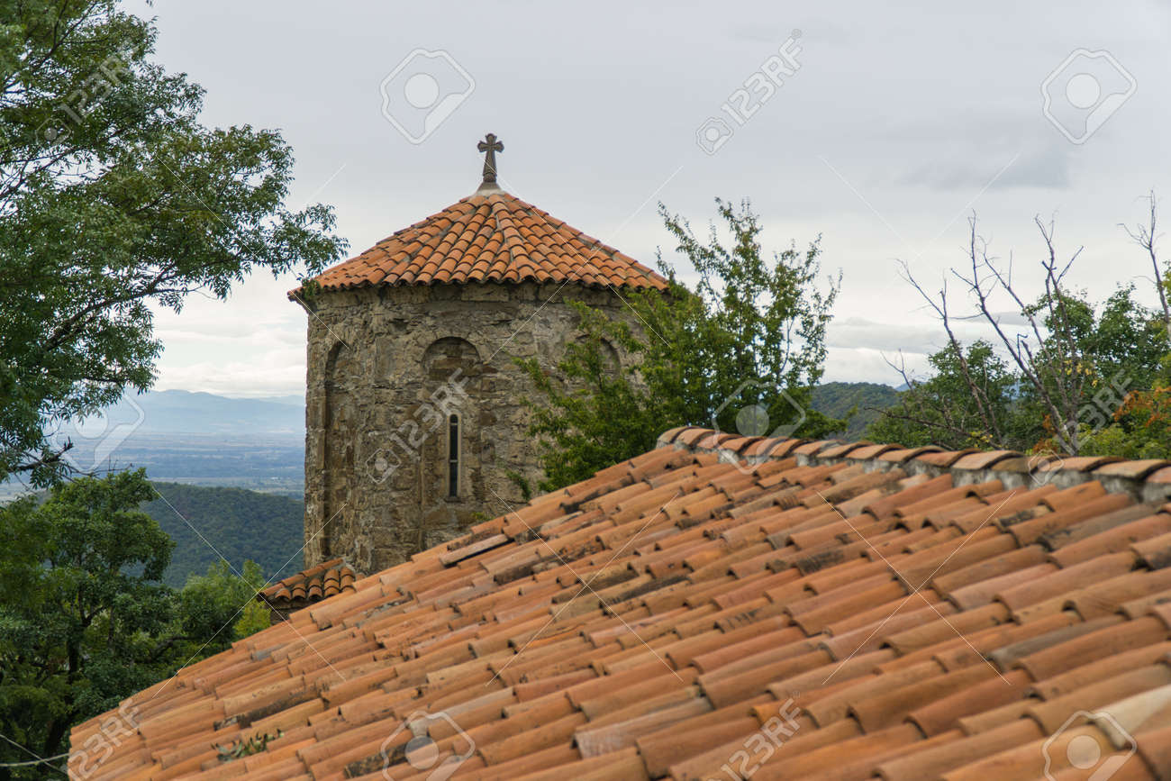 The monastery of the Dormition of the Theotokos in Nekresi. Kakheti, Georgia. Cloudy day - 77051649 The monastery of the Dormition of the Theotokos in Nekresi. Kakheti, Georgia. Cloudy day - 77051649