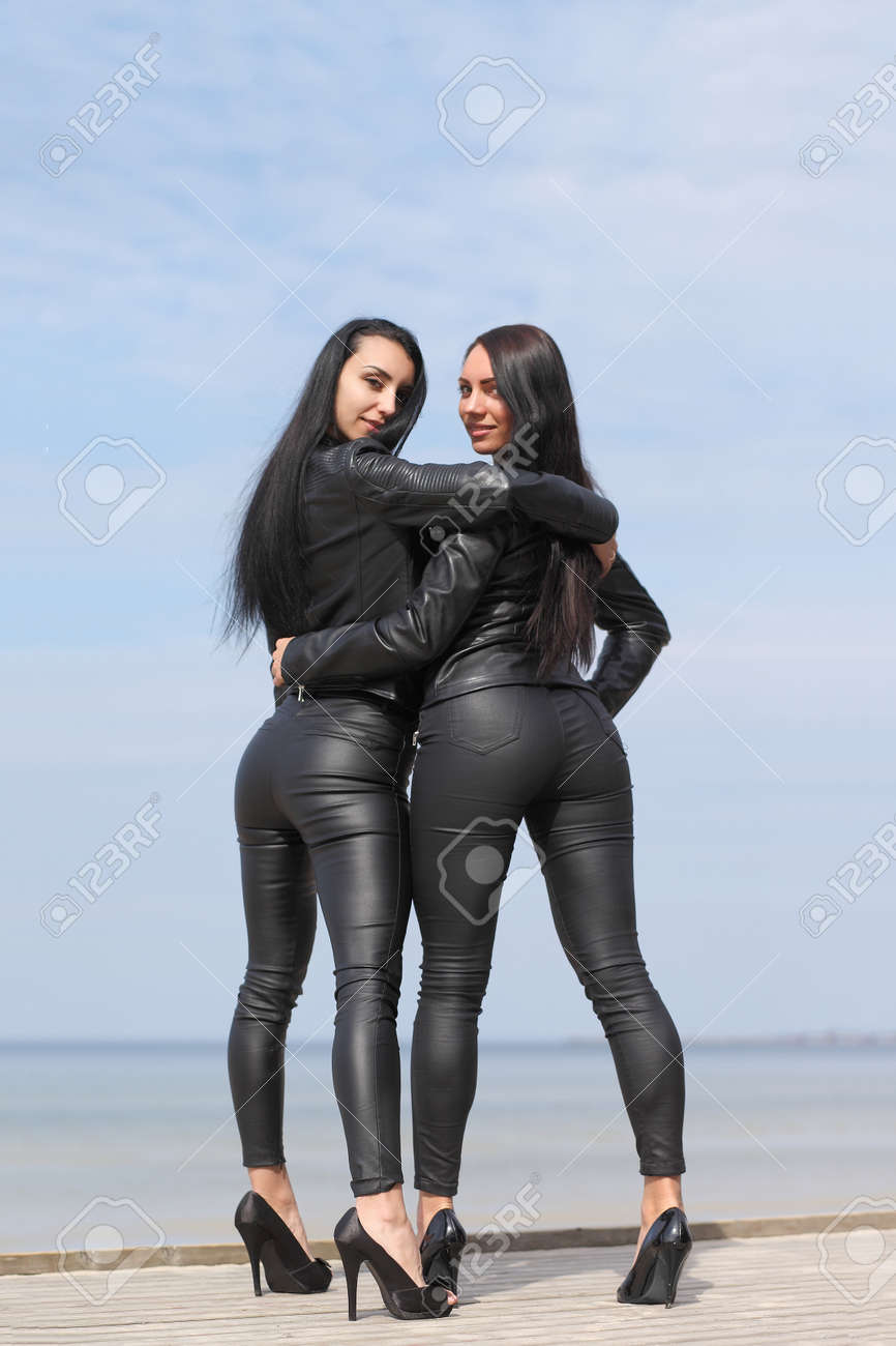 Young Slim Sexy Girl Dressed In Latex And Leather Stock Photo, Picture and  Royalty Free Image. Image 131530529.