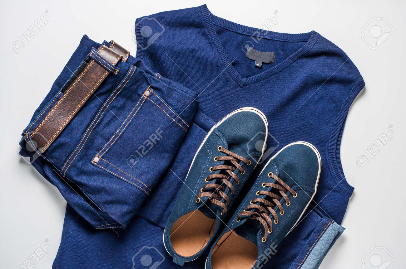 Fashionable men's clothing. Jeans and shoes on light background - 85720806 Fashionable men's clothing. Jeans and shoes on light background - 85720806
