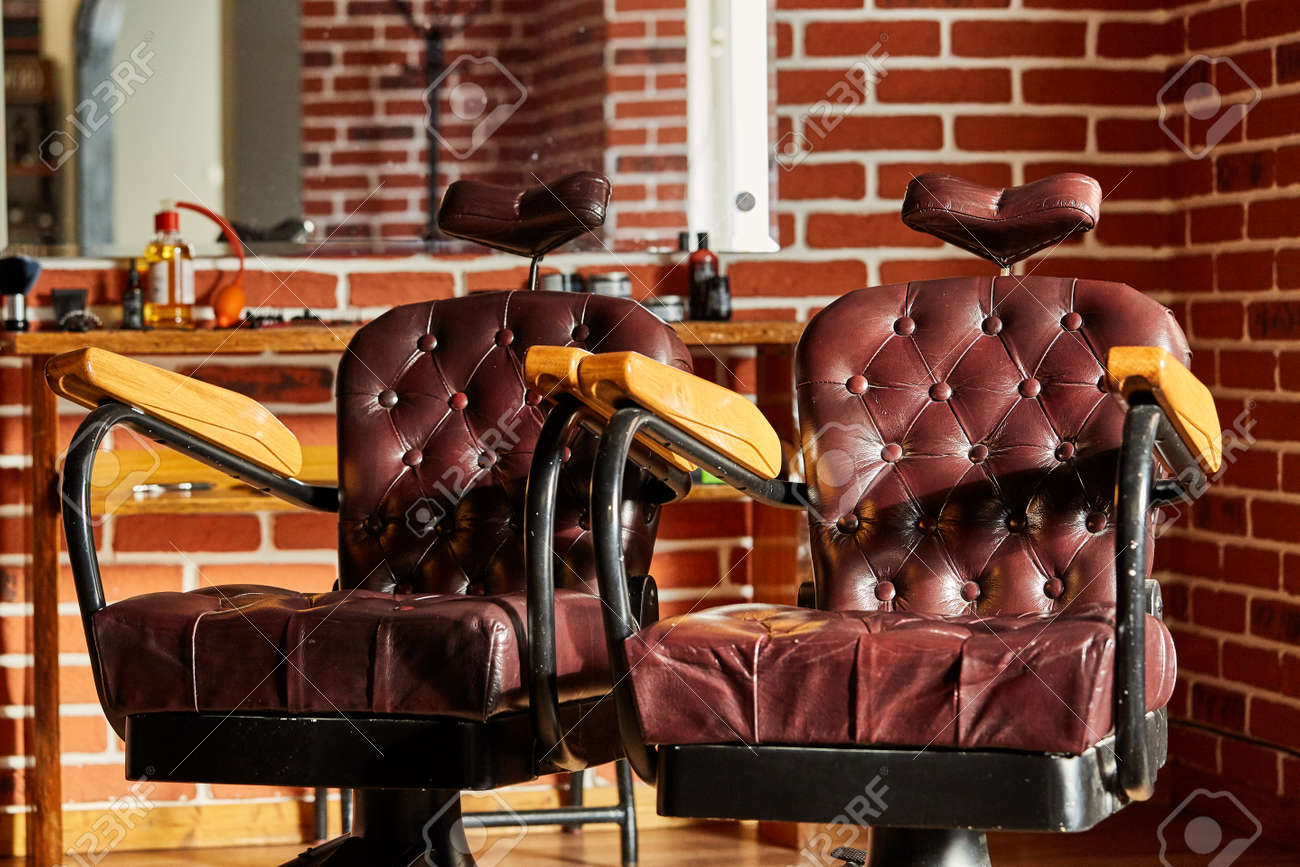 barber shop hairdresser chairs made from brown leather retro