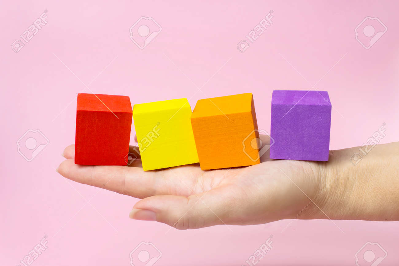 Download Woman Hand Holding Baby Cubes On Light Background Unity Concept Mockup Style Template For Creative Design