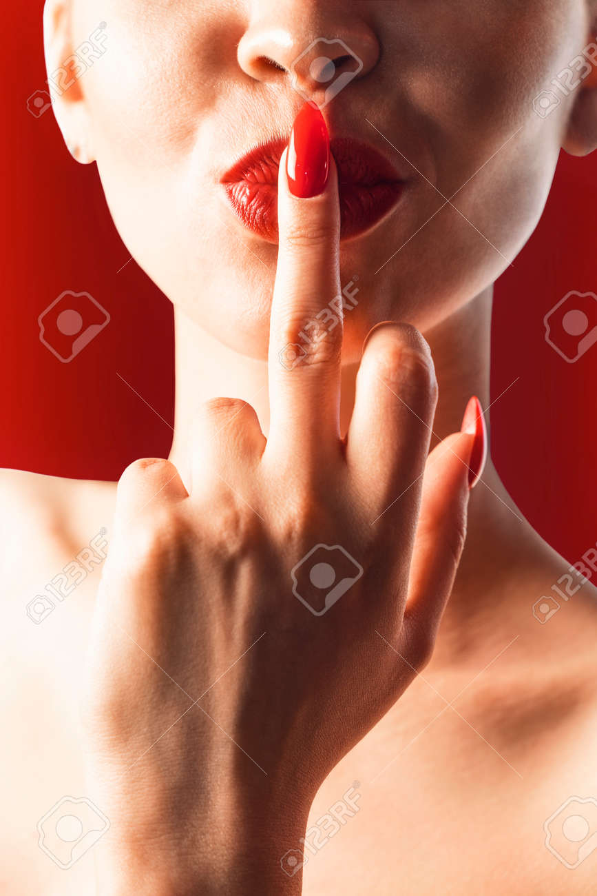 The Girl Sexually Takes A Finger In Her Mouth.Sexy Lips.Finger That Says  Fuck Фотография, картинки, изображения и сток-фотография без роялти. Image  141122065