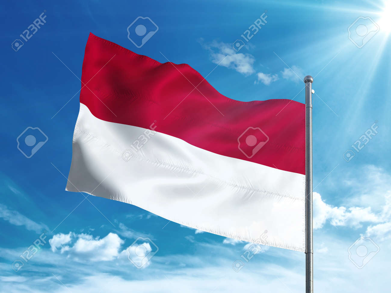 Indonesia flag waving in the blue sky - 82856053 Indonesia flag waving in the blue sky - 82856053