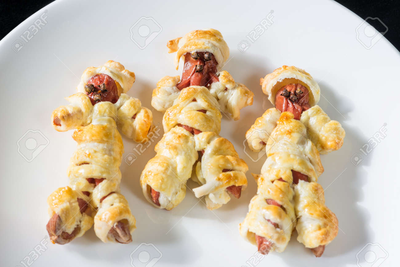 Halloween Food Sausage Mummies In Dough Cooked In The Oven Stock Photo Picture And Royalty Free Image Image 108966182