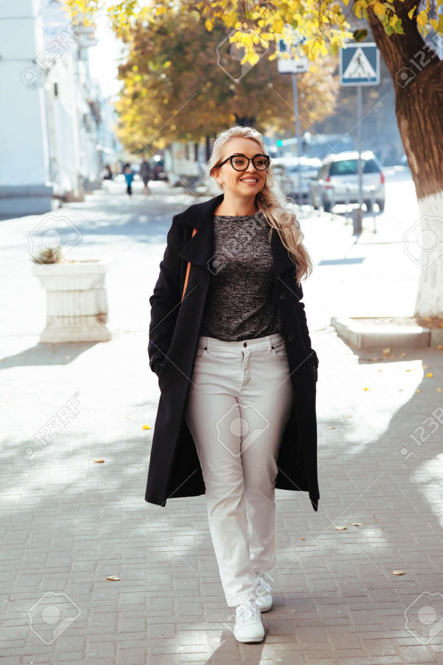 white pants leather jacket