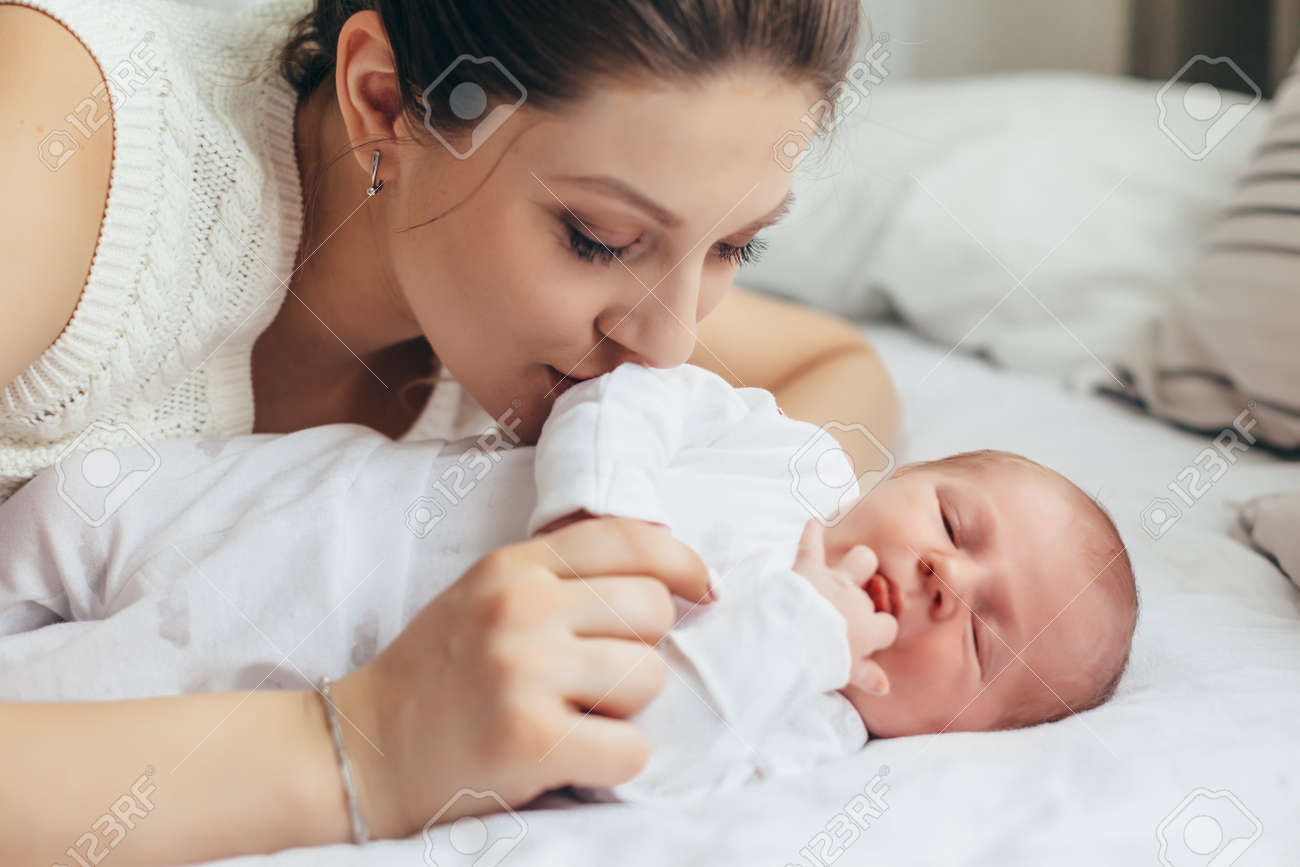 newborn baby with mother