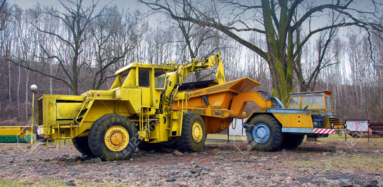 excavator bulldozer load big truck stock photo picture and royalty