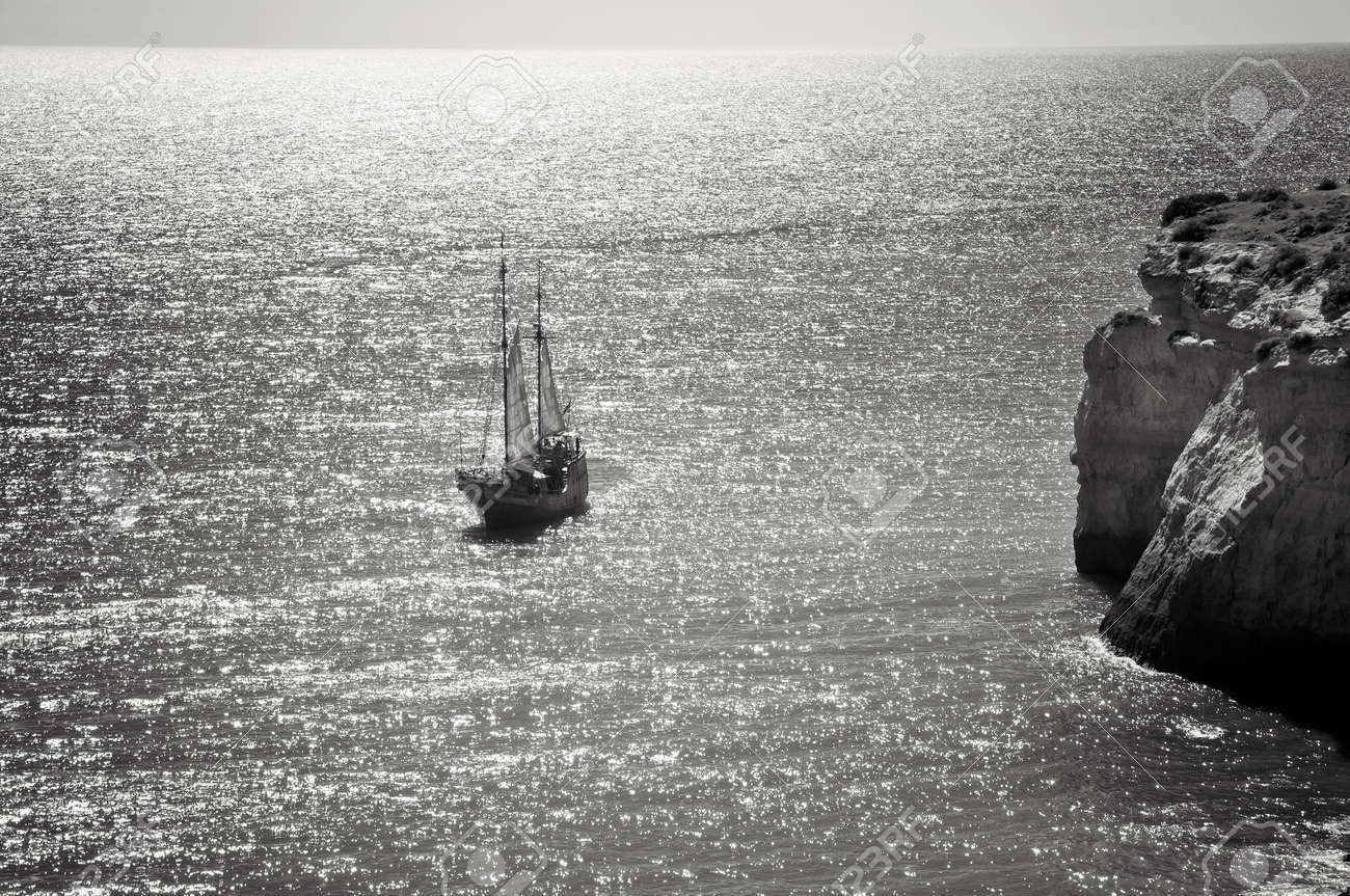 An old sailing ship on the ocean black and white photo