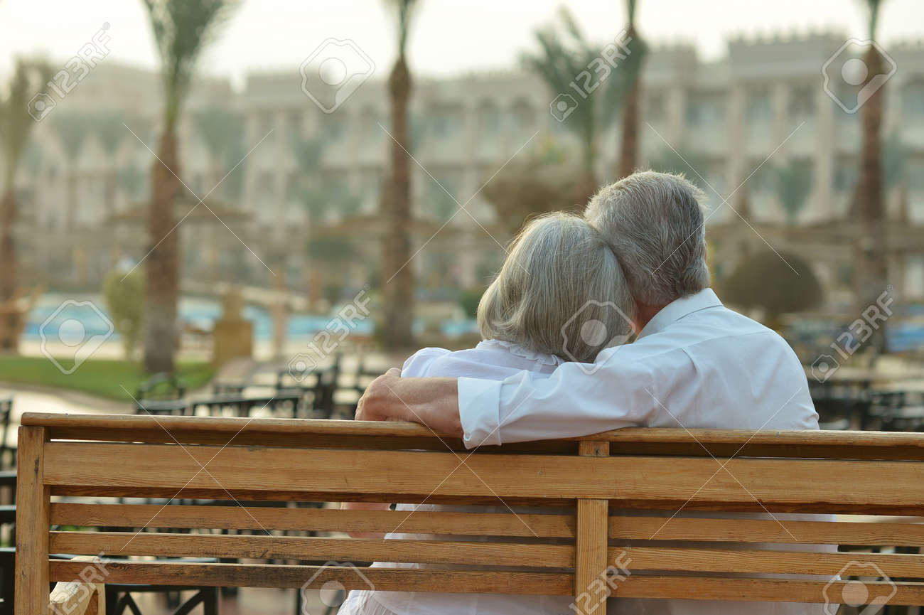 Happy Mature couple enjoy fresh air and stunning view on vacation - 47705642 Happy Mature couple enjoy fresh air and stunning view on vacation - 47705642
