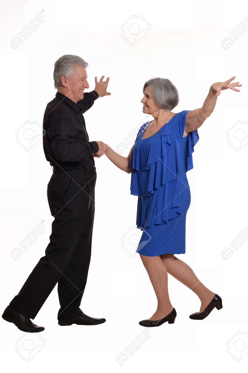 Elegant elderly couple dancing on a white background - 48616919 Elegant elderly couple dancing on a white background - 48616919