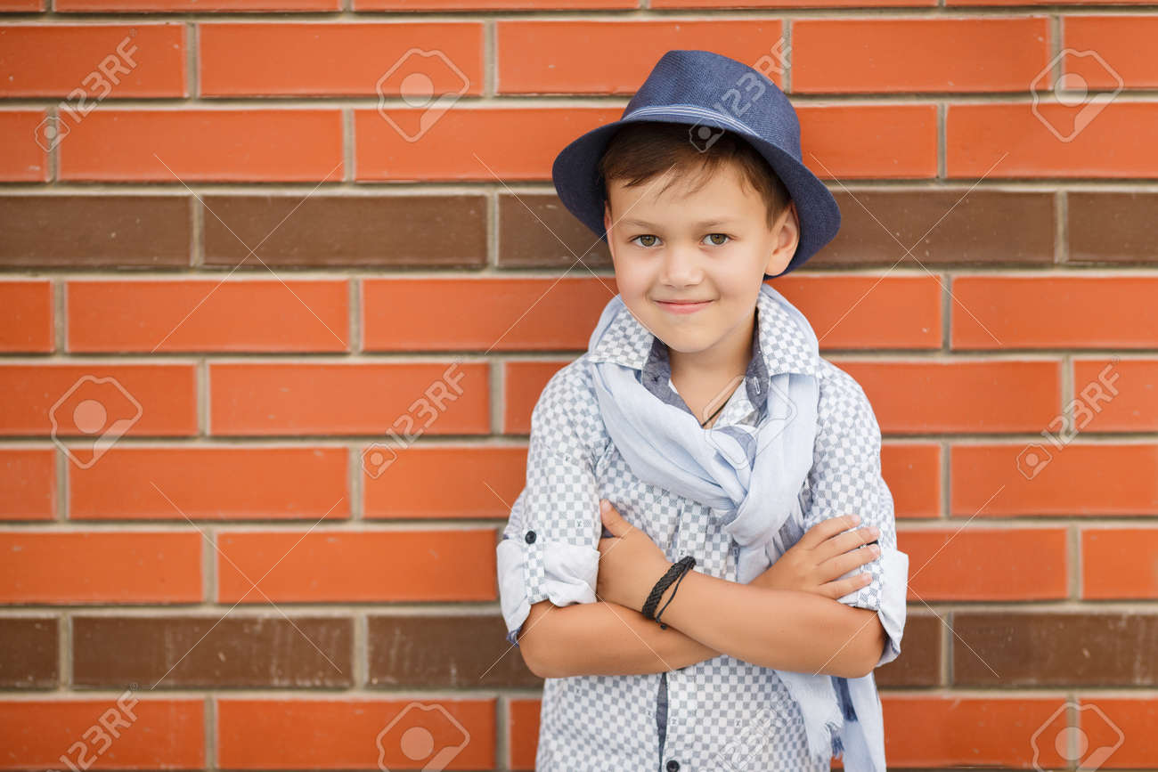 Stylish Boybrunette With Short Hair On His Head Wearing A