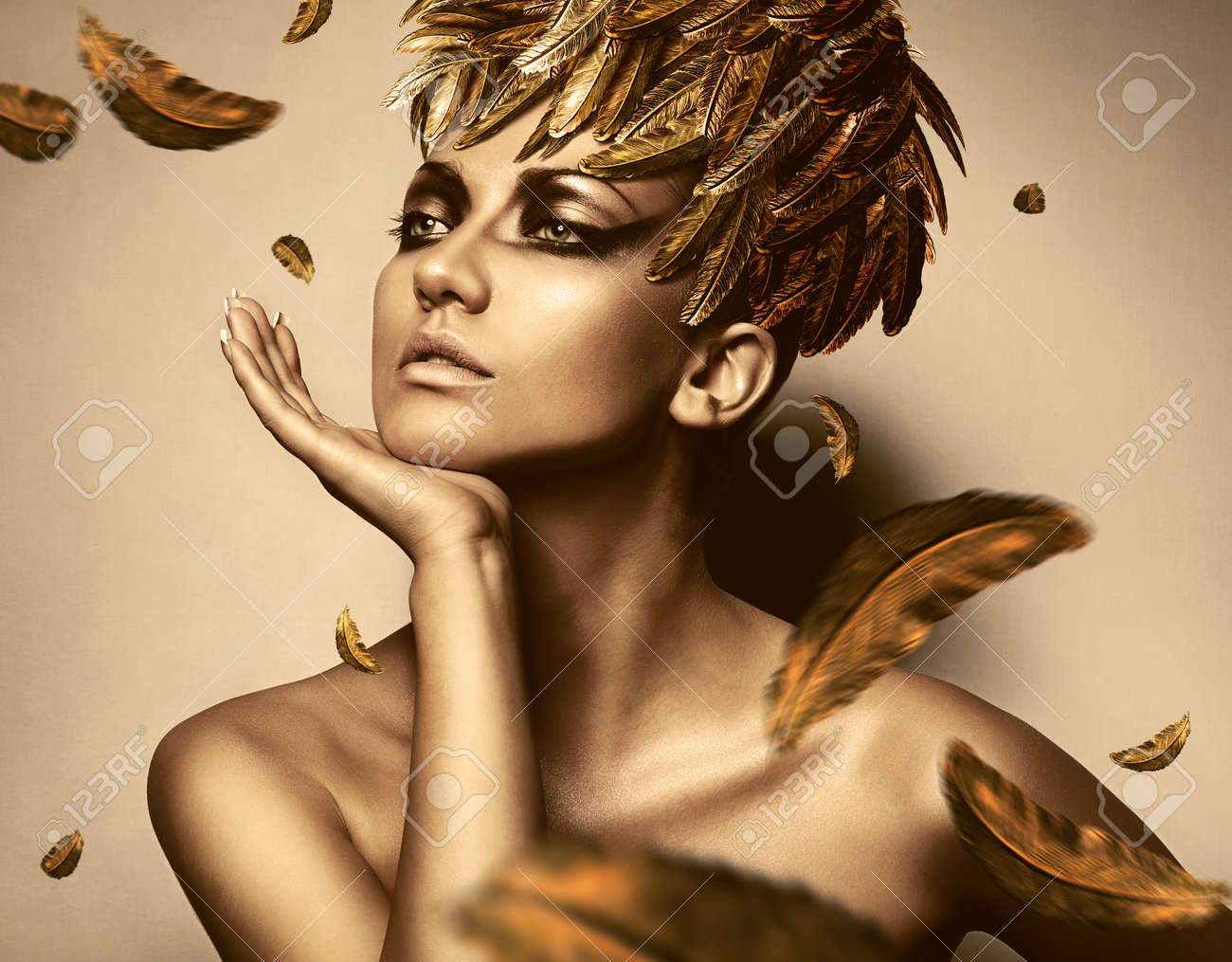 woman in feather gold hat - 31120673 woman in feather gold hat - 31120673