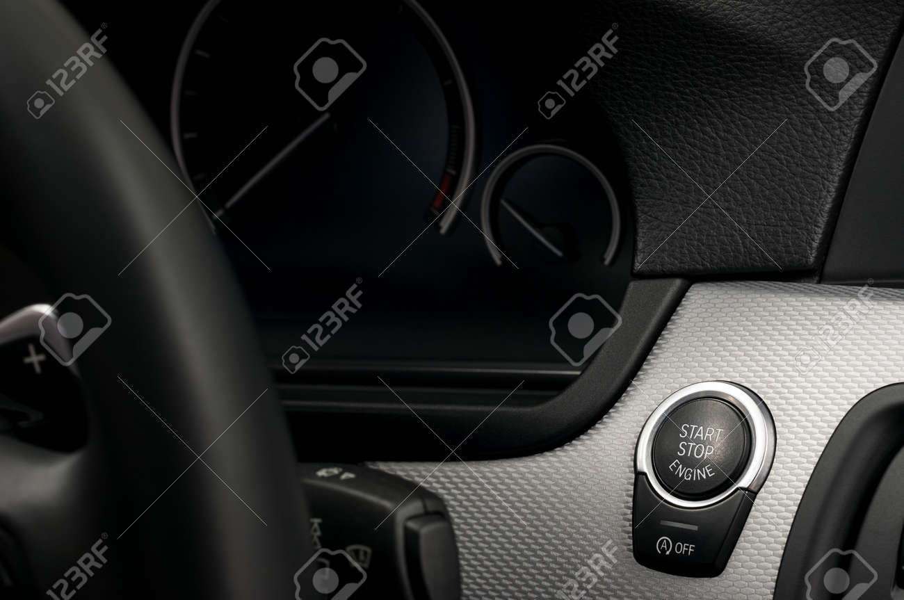 Modern car engine start and stop button. Interior detail. - 39366330 Modern car engine start and stop button. Interior detail. - 39366330