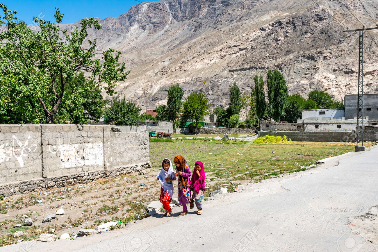 Gilgit Group Of Little Girls Is Walking At Residential Area Road On A Sunny Blue Sky Day Stock Photo Picture And Royalty Free Image Image Gilgit Group Of Little Girls Is Walking At Residential Area Road On A Sunny Blue Sky Day Stock Photo Picture And Royalty Free Image Image