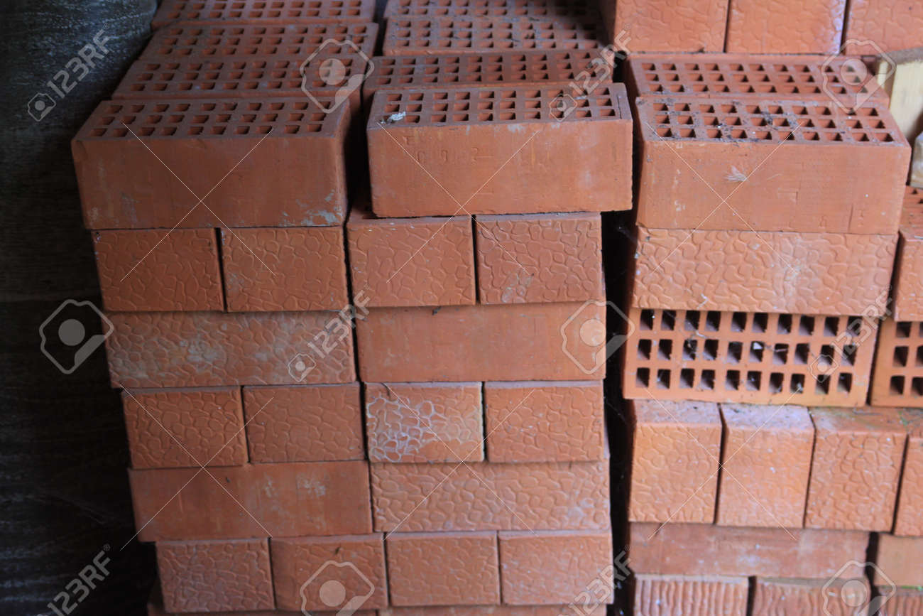 Stack Of Red Hollow Facing Bricks With Square Holes Foreground Stock Photo Picture And Royalty Free Image Image 94228637