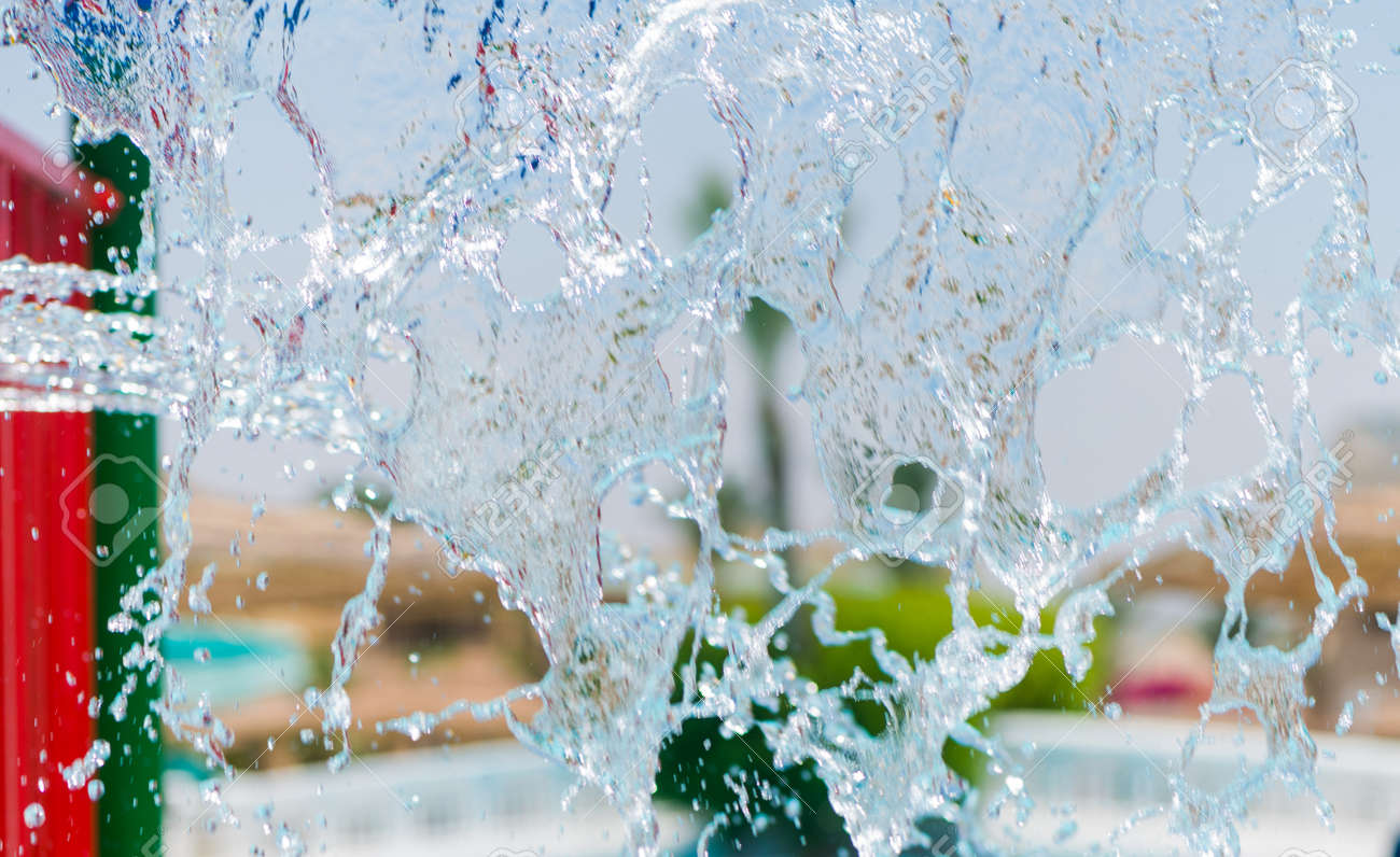 splashing water surface at sunny pool - 127951894 splashing water surface at sunny pool - 127951894